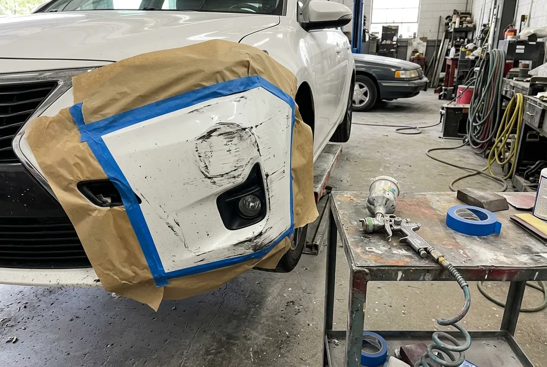 Repaired and repainted scuffed front bumper on a car in La Verne CA
